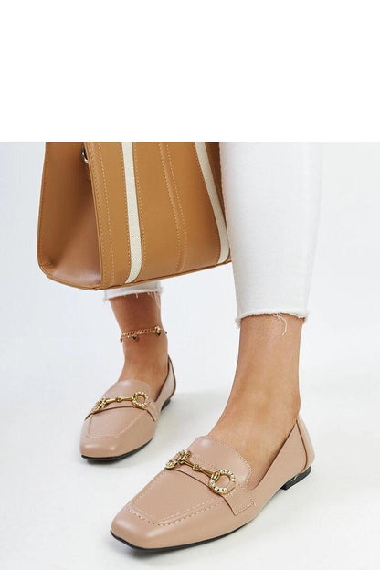 Solea Areebah moccasins displayed elegantly, highlighting the comfortable slip-on design and chic square toe suitable for everyday luxury.