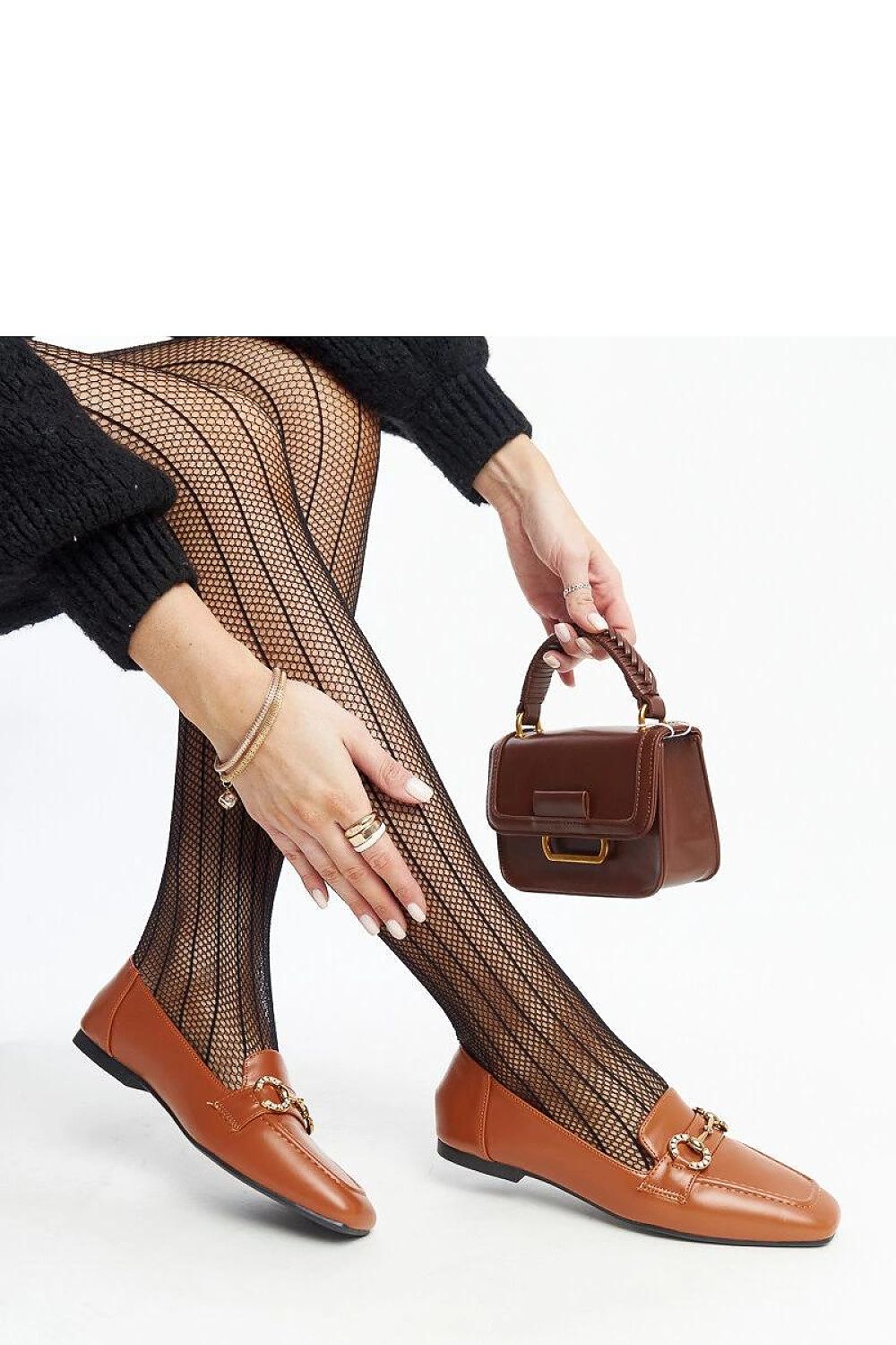 Luxurious eco-leather moccasins for women by Solea, featuring sparkling rhinestones and a low shaft for comfortable elegance.