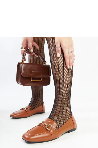 Stylish brown loafers by Solea for women, designed with a sophisticated buckle and perfect for both casual and formal occasions.