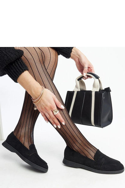 Close-up of Solea black suede loafers, showcasing the pointed toe and almond-shaped front for an exquisite look.