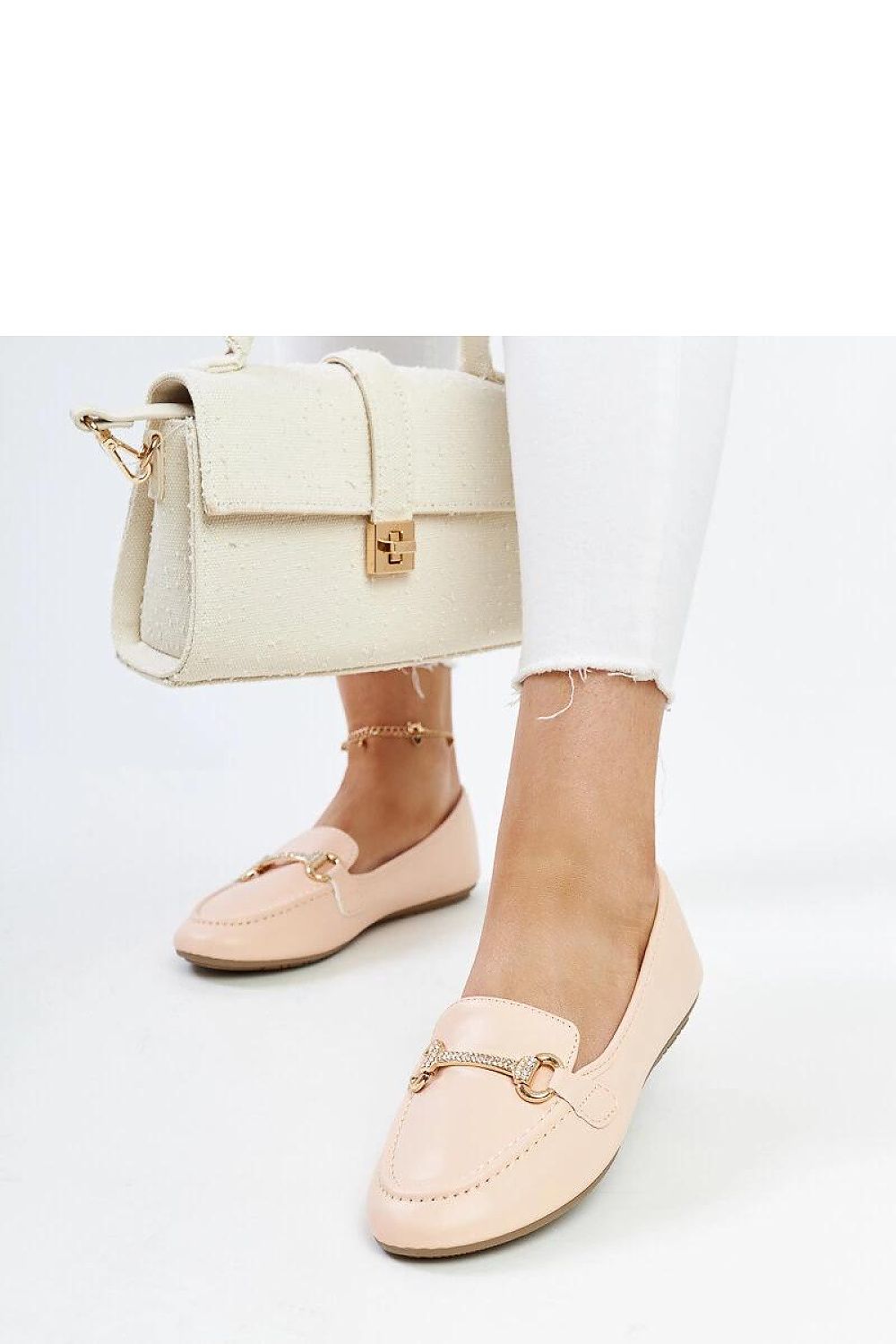 Eco-friendly leather loafers by Solea, offering a luxurious beige finish, ideal for casual summer outfits with added rhinestone embellishments.