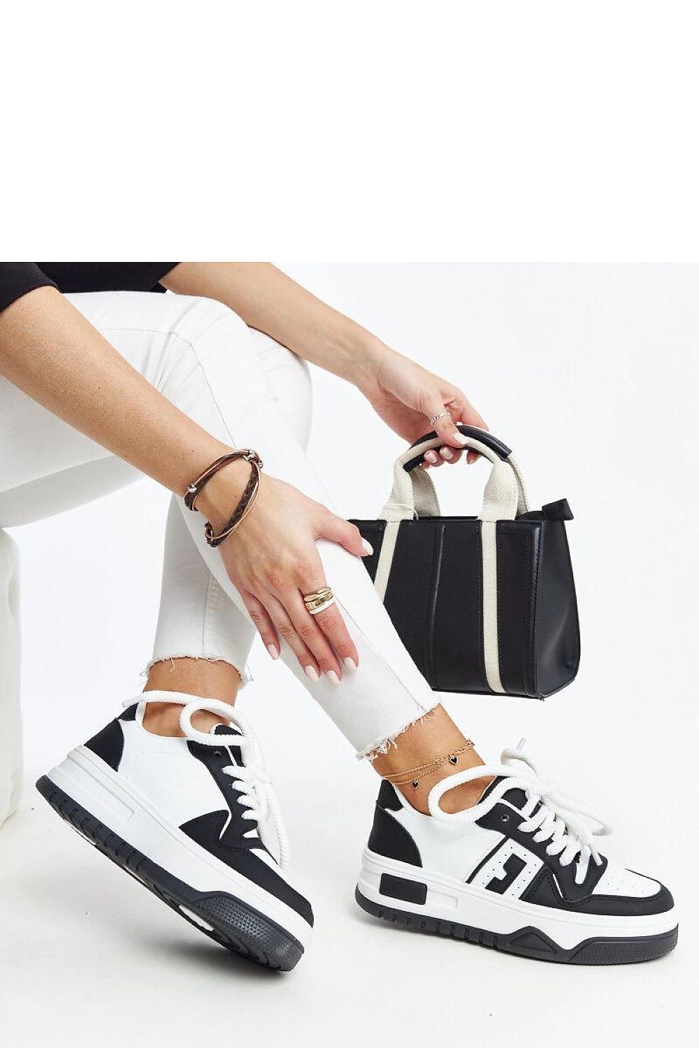 Luxury eco-leather black and white sneakers by Solea, showcasing stylish design and comfort for EU 36-41 and US 5.5-10.5.