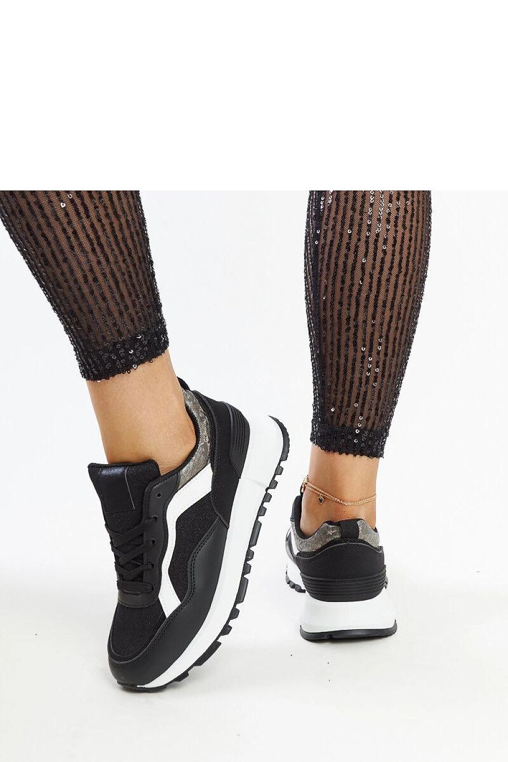 View of Solea black glitter platform sneakers, ideally suited for Spring/Summer collections, blending style with comfort.