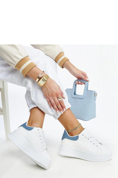 Close-up view of Solea Ottavia white eco-leather platform sneakers, showcasing the premium material and intricate lace details for ultimate comfort.