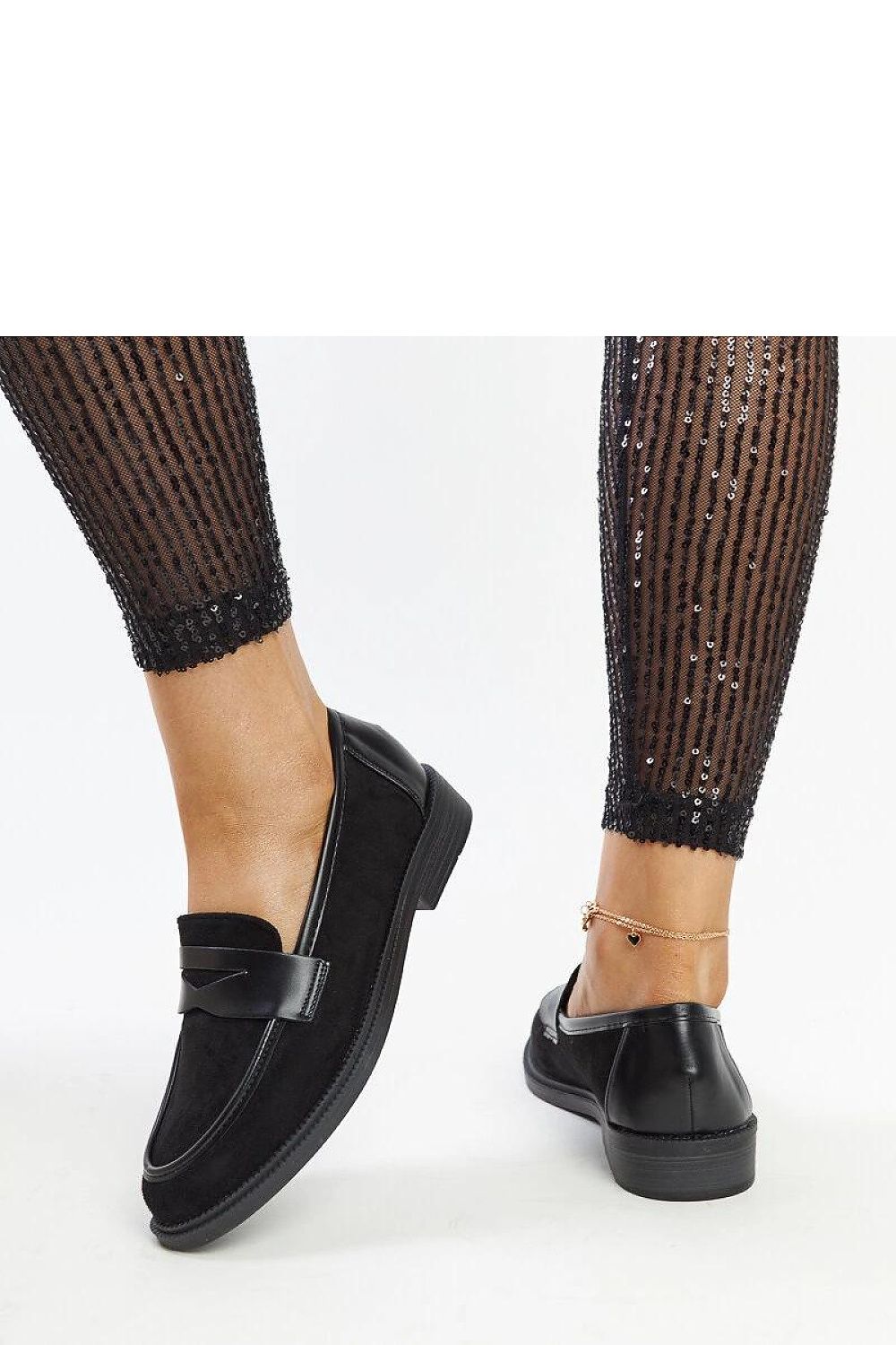 Luxurious black suede moccasins by Solea for women, featuring a low profile and comfortable slip-on style, crafted from sustainable materials.