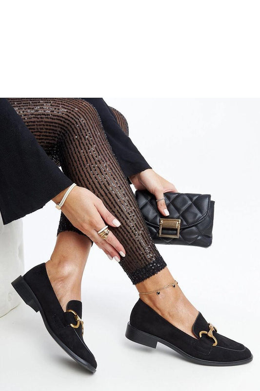 Close-up of Solea black moccasins featuring a modern square toe and high-quality craftsmanship, perfect for summer elegance.