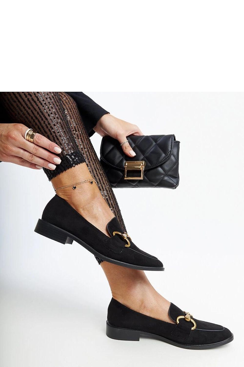 Solea luxurious eco leather moccasins in black, ideal for casual and elegant outfits, with precise stitching and a chic buckle.