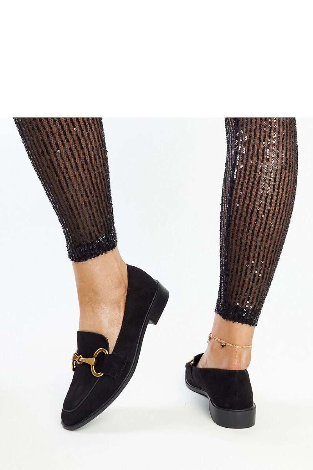 Elegant Solea black moccasins featuring a modern square toe design, perfect slip-on footwear for both casual and sophisticated occasions.