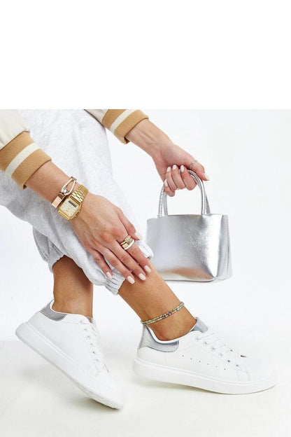 Close-up of Solea luxury white platform sneakers, showcasing the lace-up closure and eco leather fabric for a sophisticated look.