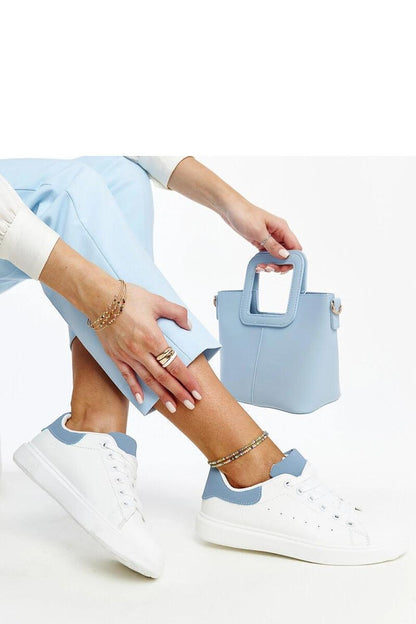 Elegant white platform sneakers by Solea, designed with a lace-up closure and cushioned rubber sole for premium summer wear.