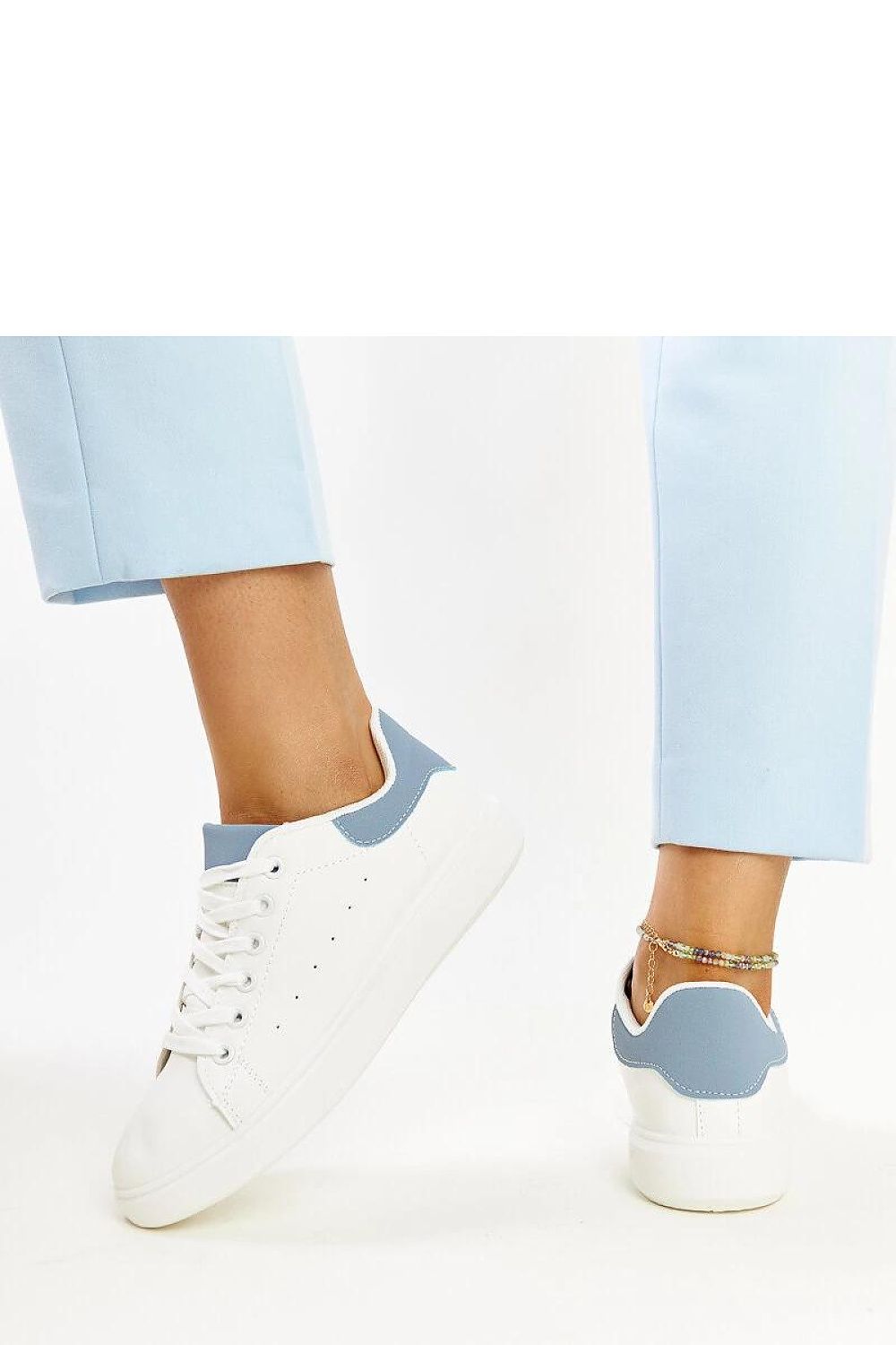 Luxury white platform sneakers by Solea, crafted from eco leather with silver accents, perfect for stylish summer outings.