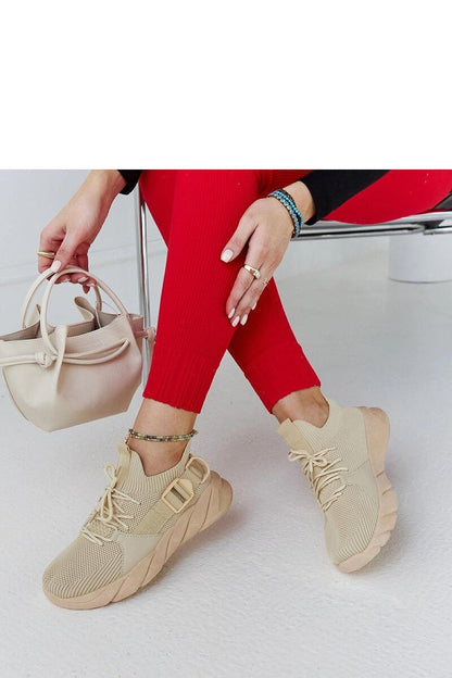 Solea Faruz sports sneakers in fashionable beige, showcasing a comfortable lace-up design for optimum fit.