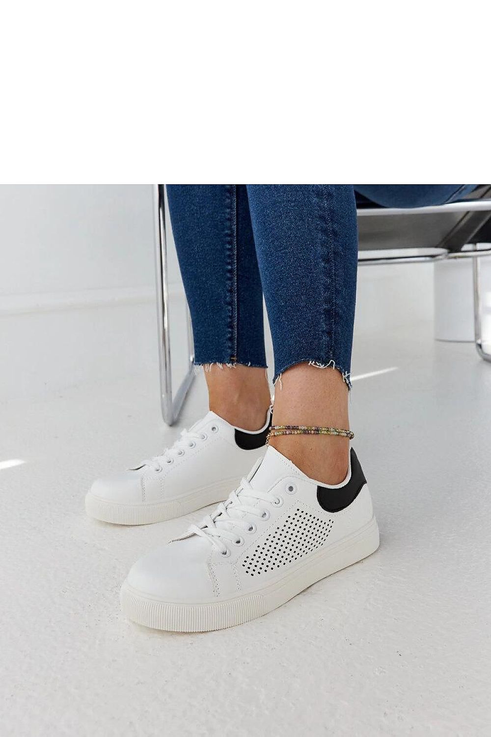 Luxury white openwork sneakers Semhar by Solea, crafted in eco leather for stylish summer wear, featuring a lace closure and a lightweight rubber sole.