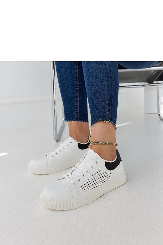 Luxury white openwork sneakers Semhar by Solea, crafted in eco leather for stylish summer wear, featuring a lace closure and a lightweight rubber sole.