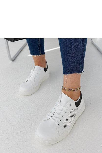 Close-up view of Solea luxury white openwork sneakers Semhar featuring high-quality eco leather and a stylish lace closure, ideal for casual summer looks.