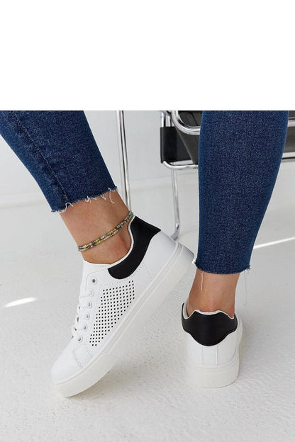 Eco leather luxury white openwork sneakers Semhar by Solea, emphasizing their sporty yet chic design suitable for summer outfits.