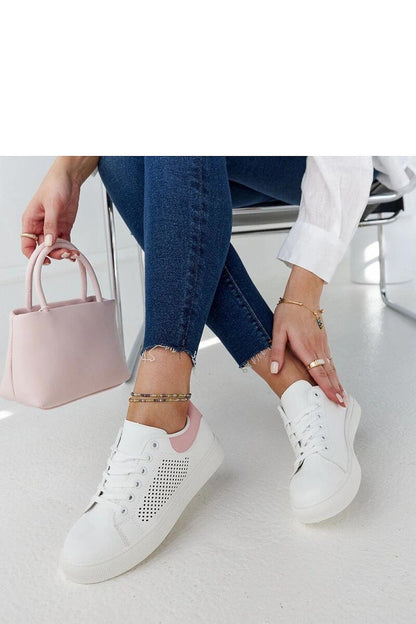 Side view of Solea's luxury white openwork sneakers Semhar, highlighting the delicate craftsmanship and breathable eco leather, ideal for summer fashion.