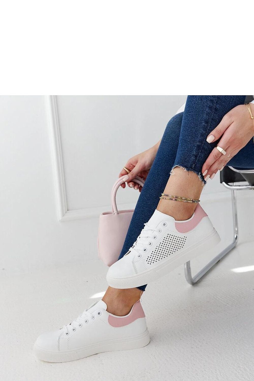 Elegant Semhar openwork sneakers in white eco leather by Solea, designed for summer comfort and style, featuring a fashionable lace-up design.