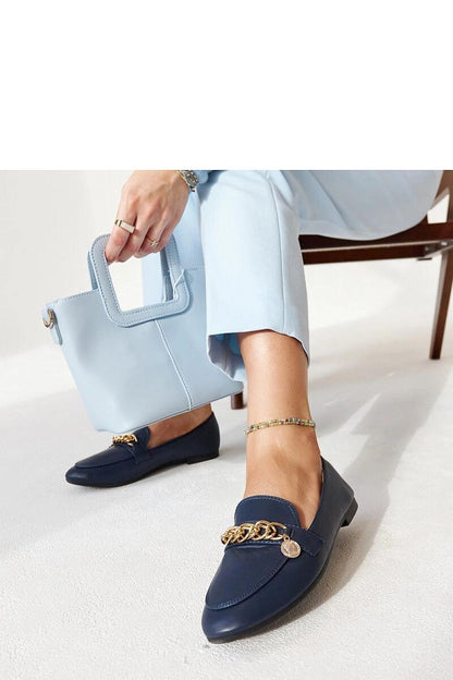 Side view of Solea's navy blue Scaletta moccasins, highlighting their slip-on design and lightweight construction for ultimate comfort.