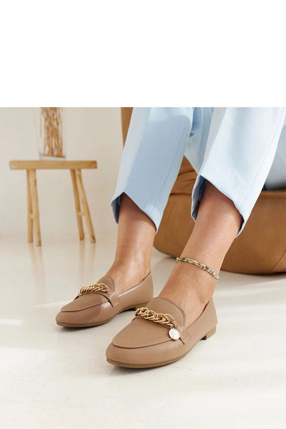 Side view of Solea's navy blue Scaletta moccasins, showcasing eco-leather and sophisticated chain decoration for a modern touch.