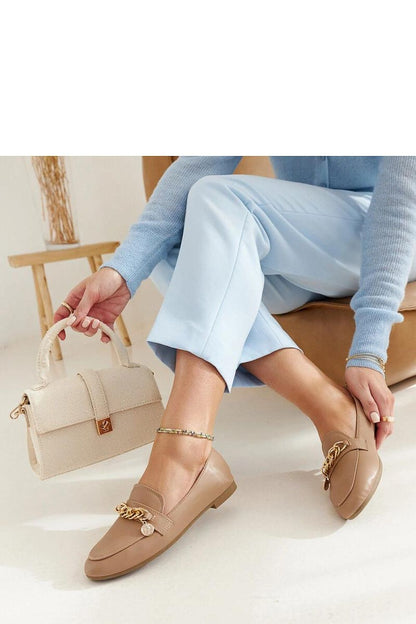 Elegant navy blue Scaletta moccasins by Solea displayed elegantly, highlighting their slip-on style and lightweight breathable material.