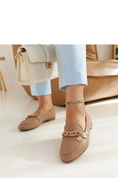 Elegant navy blue Scaletta moccasins by Solea, crafted from eco-leather, showcasing a sophisticated almond toe design and chic chain decoration.