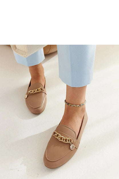 Close-up view of Solea navy blue Scaletta moccasins, highlighting the modern almond toe shape and elegant chain detail for a refined look.