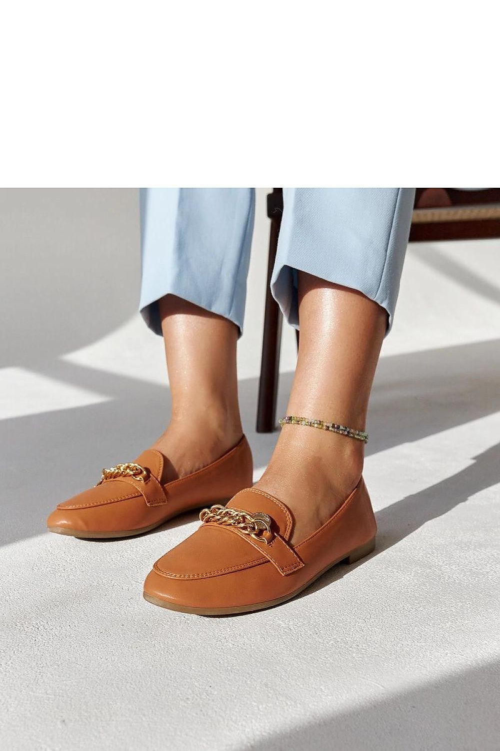 Solea elegant navy blue moccasins displayed in various sizes, showcasing the perfect blend of style and functionality with a luxurious finish.