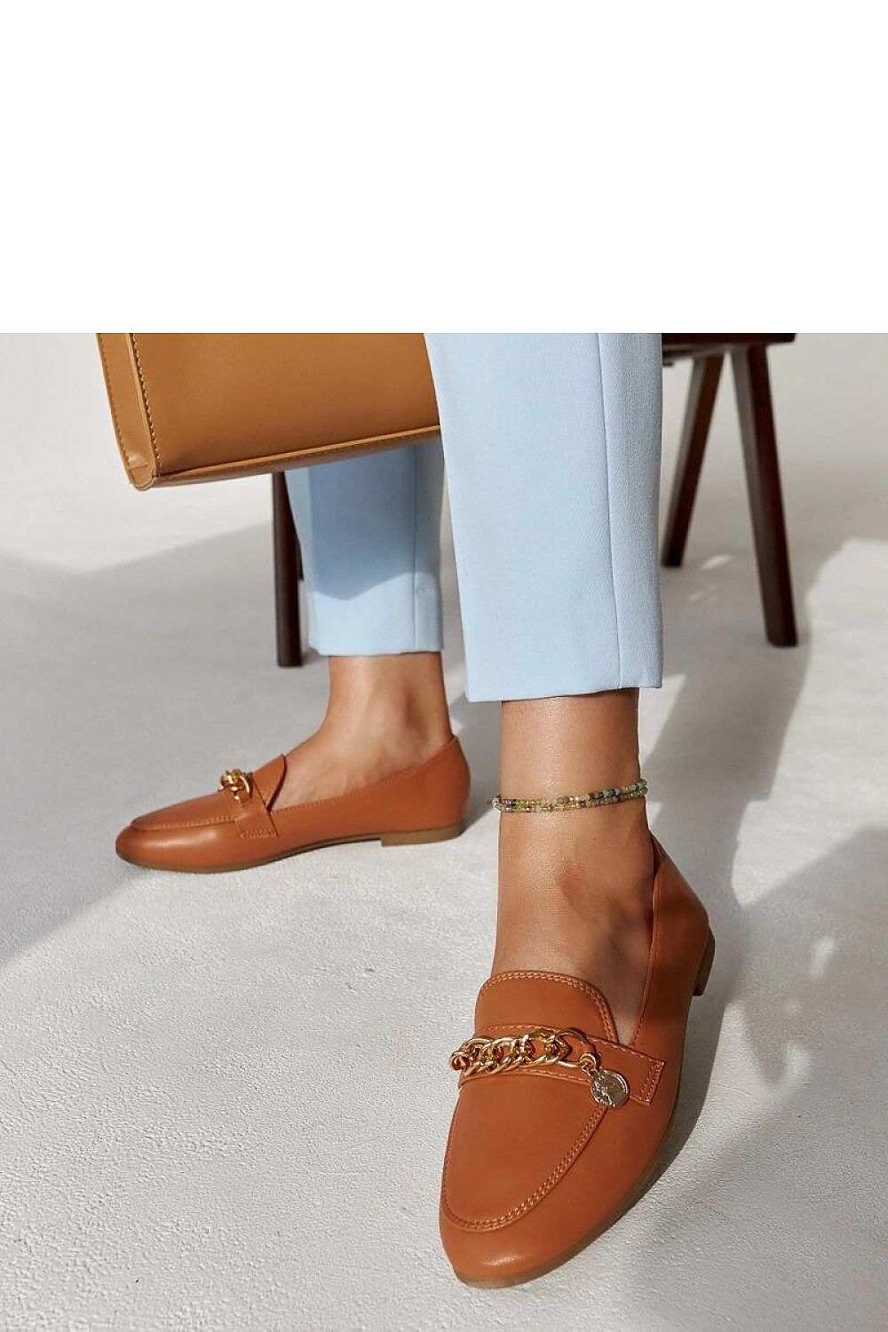 Lightweight and breathable navy blue moccasins by Solea, showcasing an elegant almond toe, ideal for both daily wear and special events.