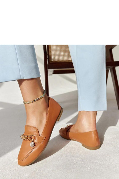 Solea's elegantly designed navy blue moccasins, featuring a durable synthetic sole and eco-leather upper, embodying sophistication and comfort.