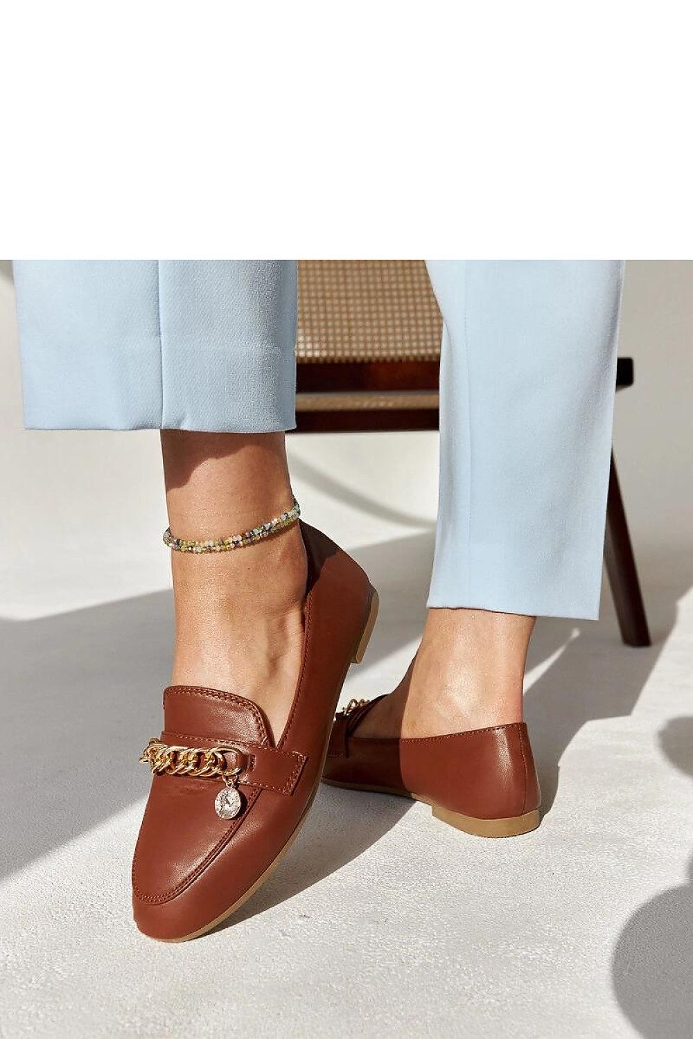 Lightweight eco-leather navy moccasins from Solea, featuring a modern almond toe and luxurious design for refined fashion.