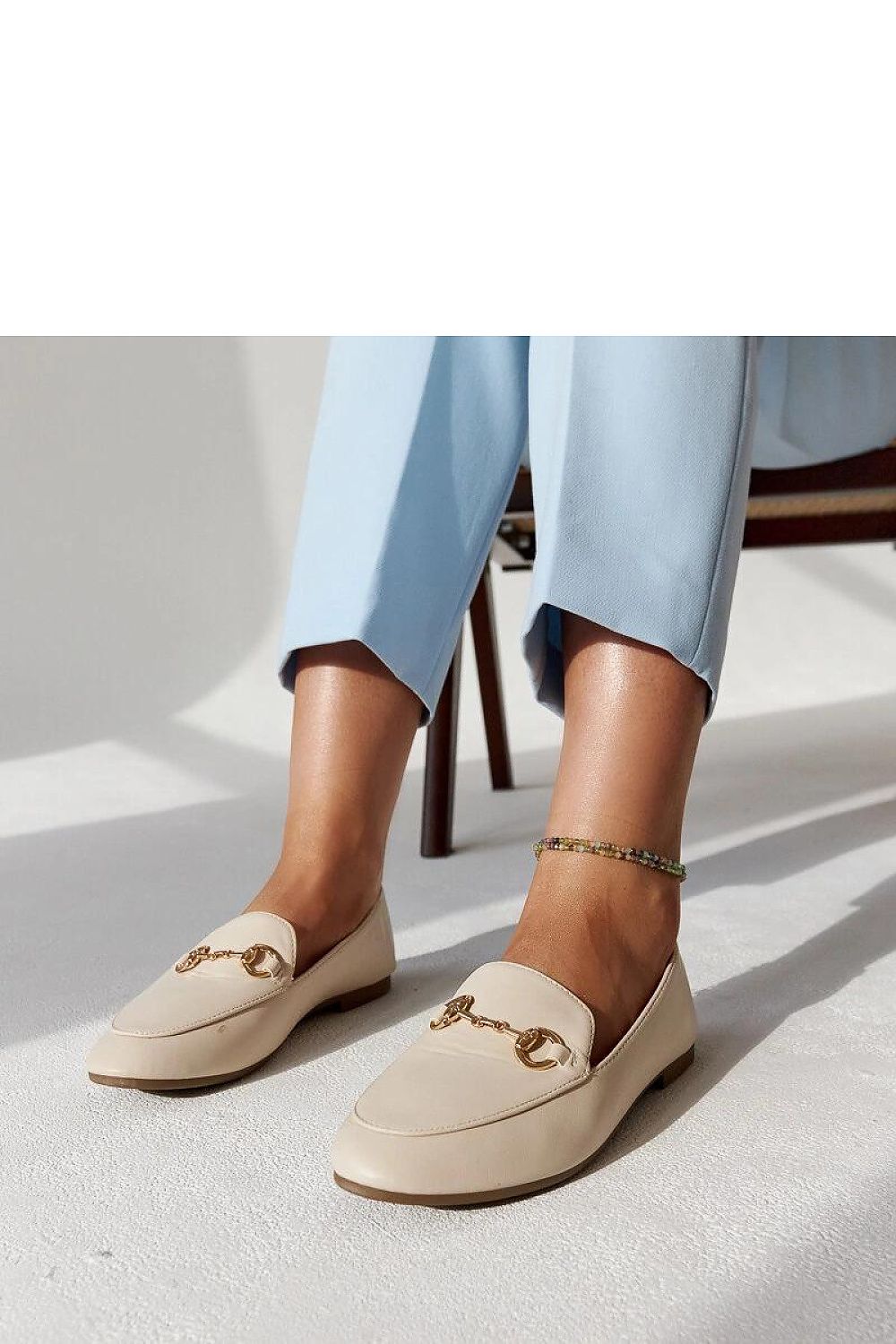 Luxurious Solea Erminia Beige Eco-Leather Loafers featuring a sophisticated buckle, designed for EU sizes 36-41 and US sizes 5.5-10.5, showcasing an elegant almond toe and flat sole, ideal for stylish summer wear.