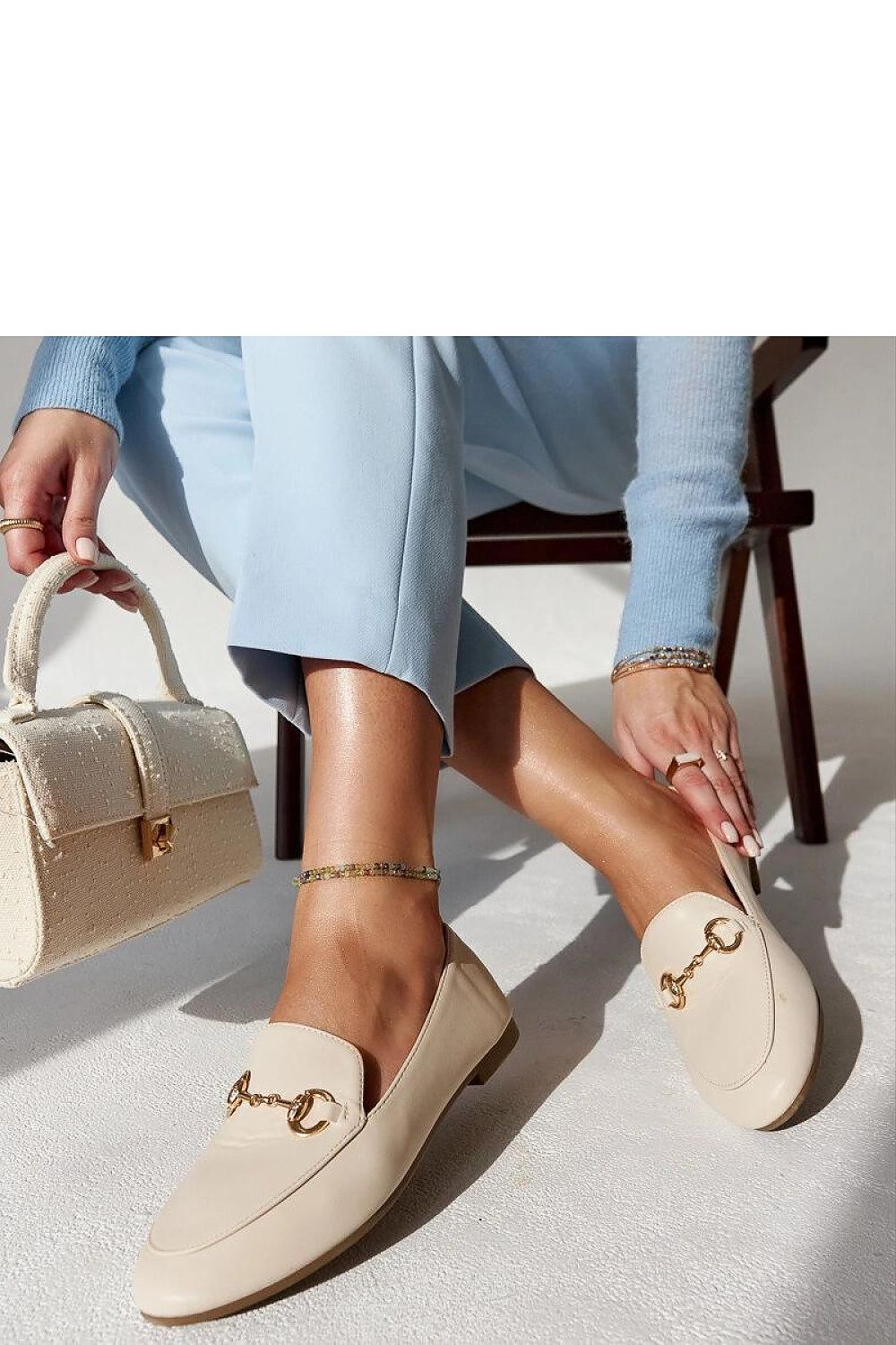 Stylish Solea Erminia loafers in beige eco-leather, featuring a chic buckle closure, designed for comfort and trendsetting style during hot summer days.