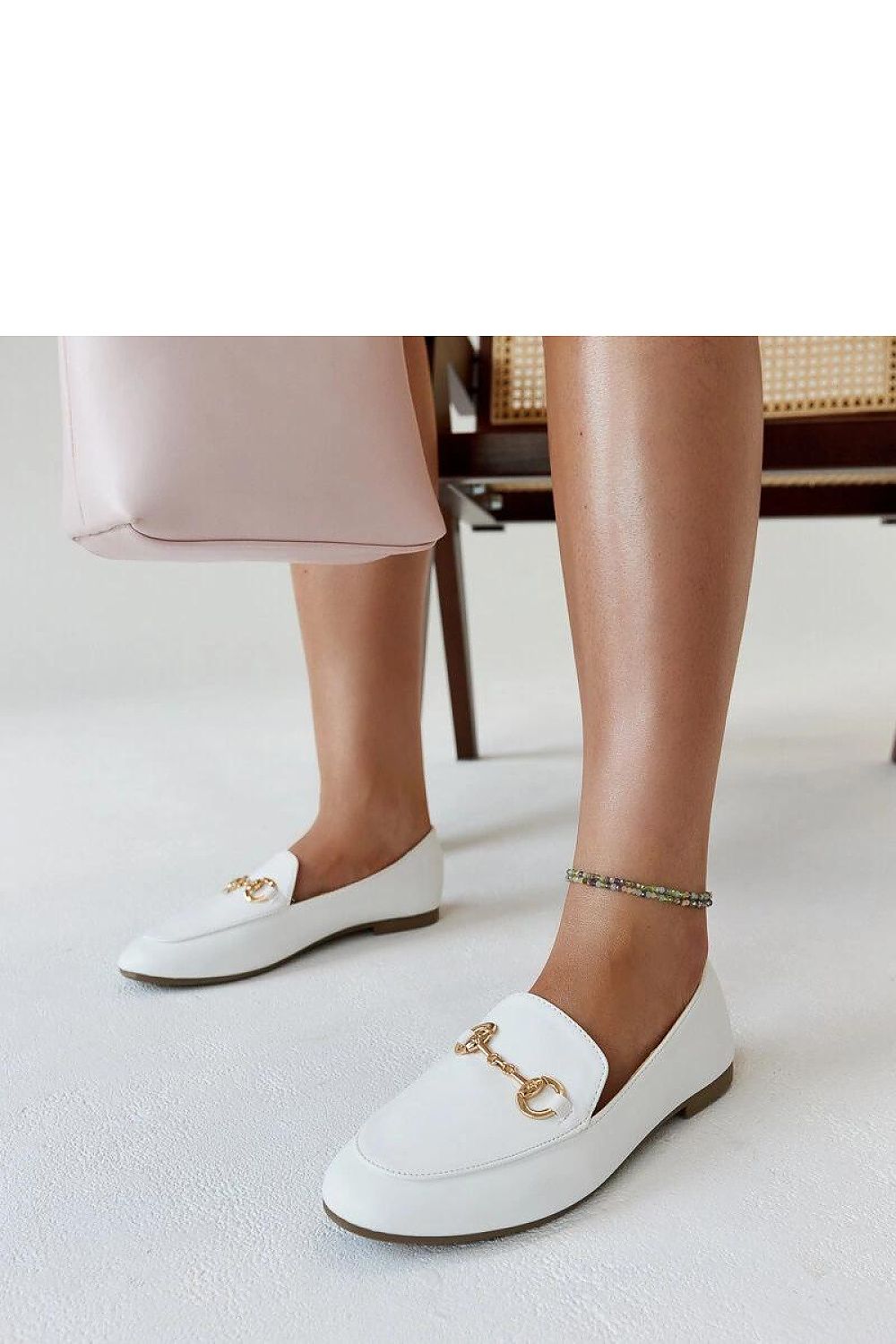 Elegant Solea Erminia loafers in beige eco-leather showcasing a chic buckle, ideal for stylish summer outfits.