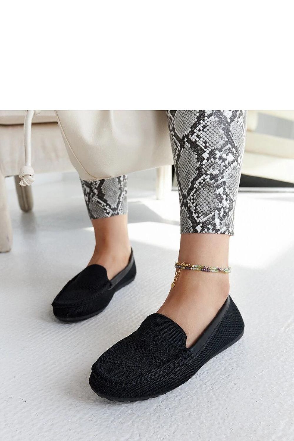 Chic and fashionable flat loafers by Solea made from breathable fabric, designed for a summer day out.