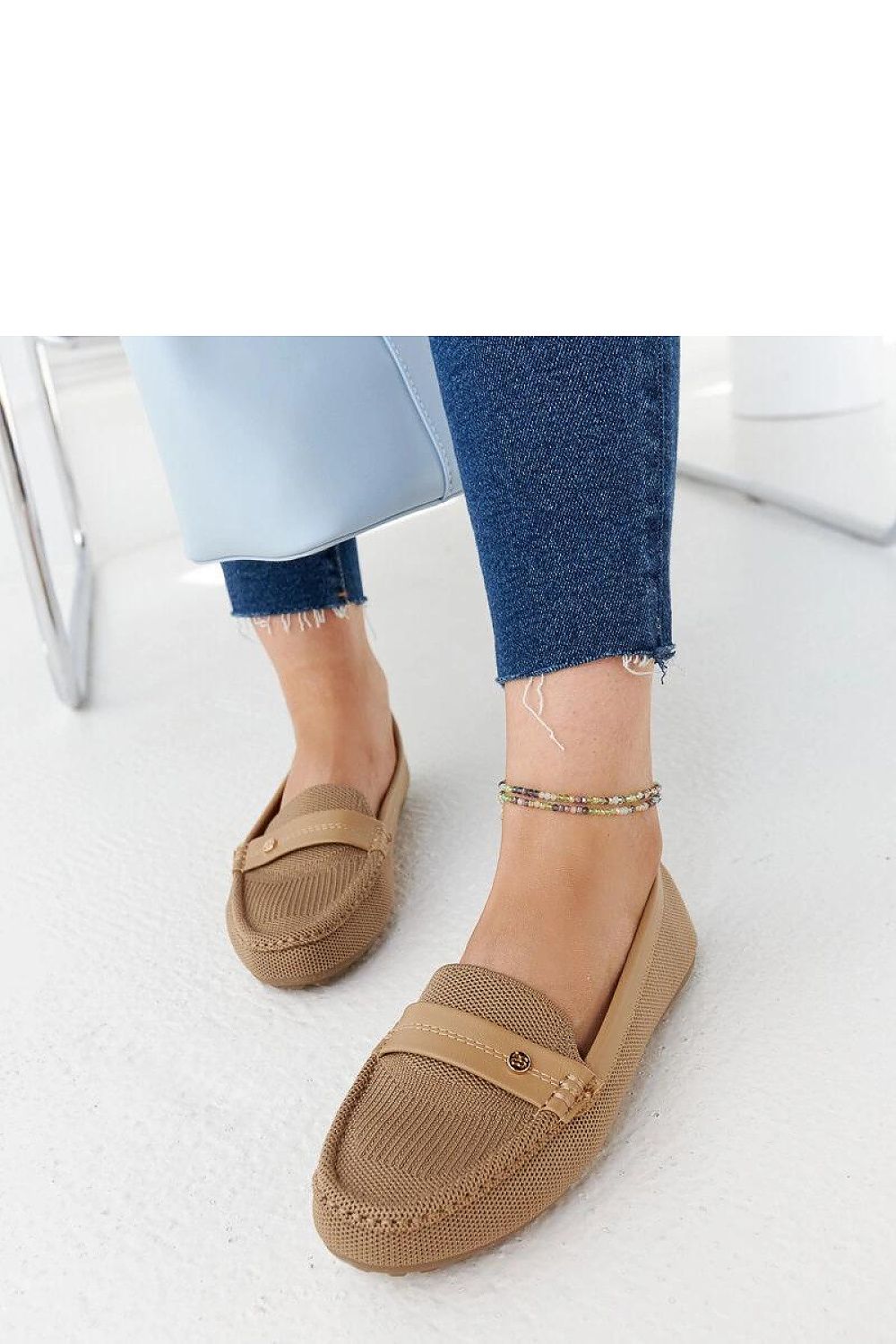 Solea women's loafers in chic beige, highlighting a flat sole ideal for stylish summer days.