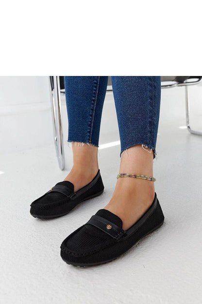 Solea beige loafers elegantly displayed, embodying sophistication and ease for fashionable women.