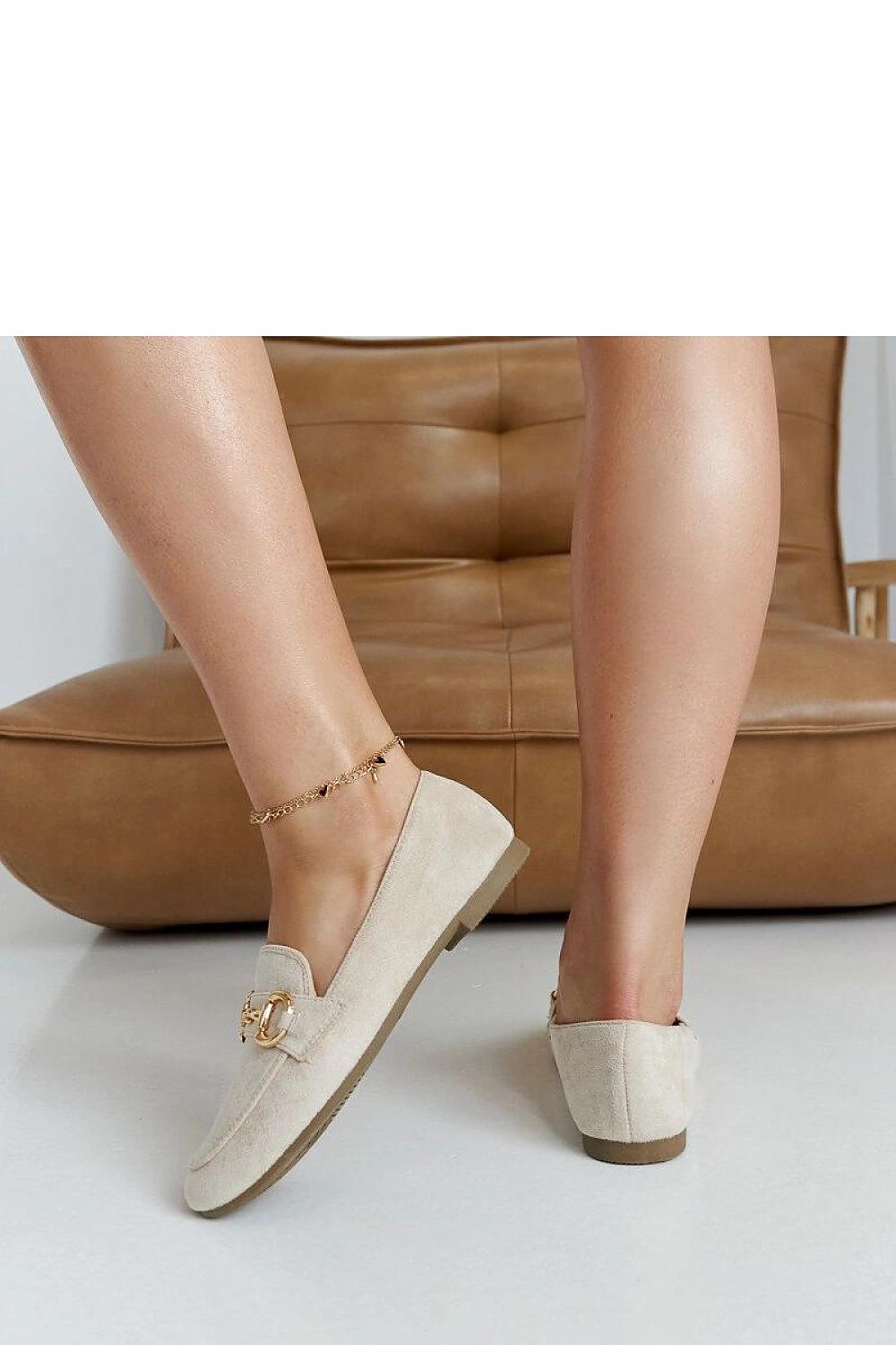 Solea stylish beige loafers displayed on a flat surface, highlighting their lightweight eco leather material and comfortable almond toe shape.