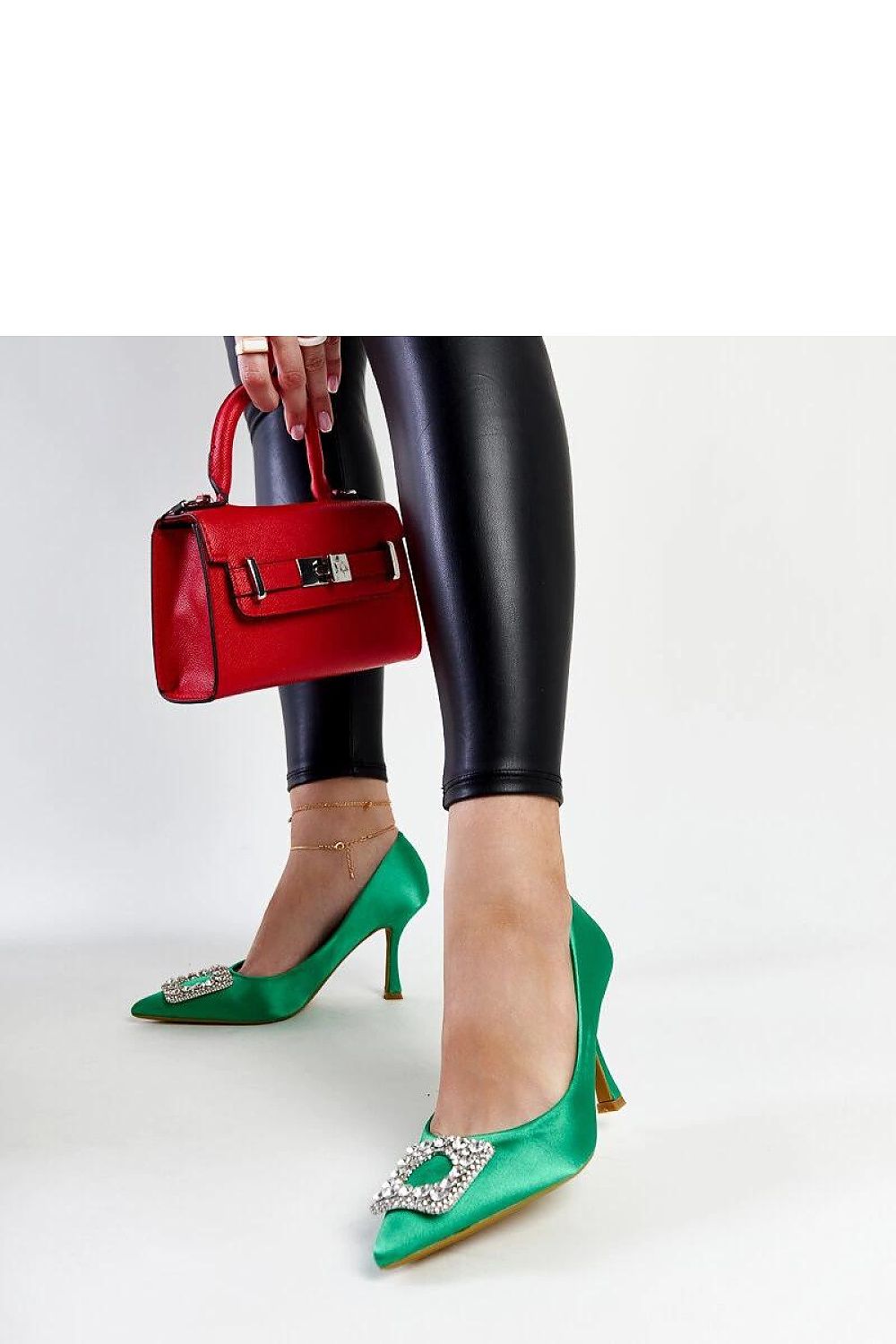 Close-up of Solea's beige satin high heel pumps featuring exquisite rhinestone details, ideal for adding sophistication to any summer outfit.