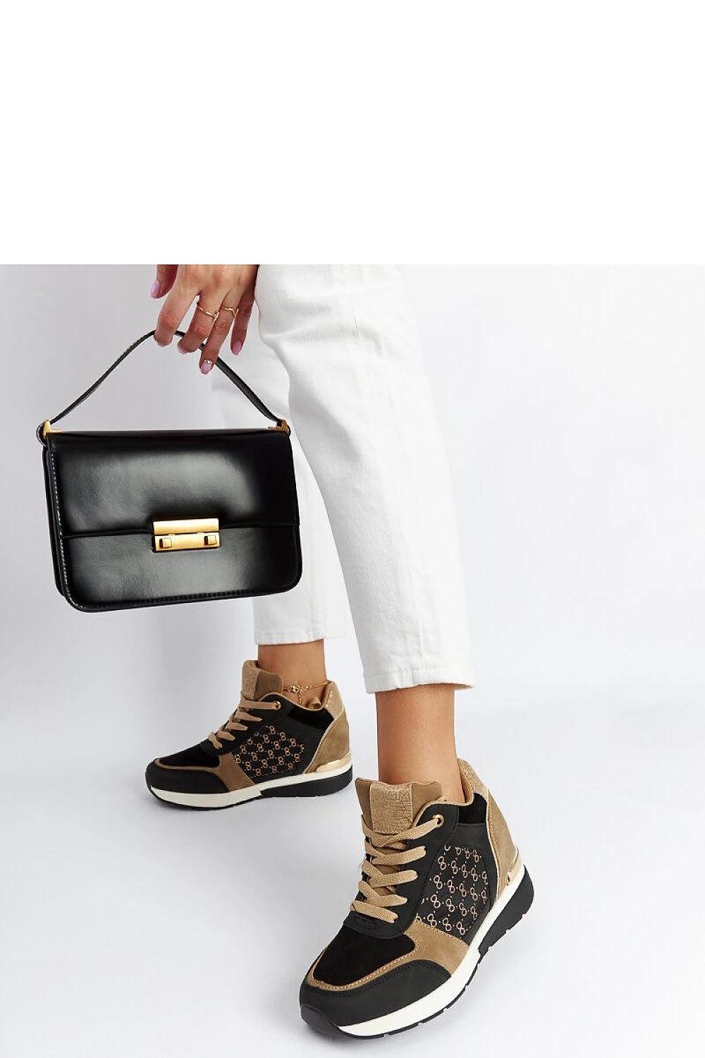 Close-up of Solea Black Eco-Leather Wedge Sneakers featuring quality craftsmanship and lace-up closure.