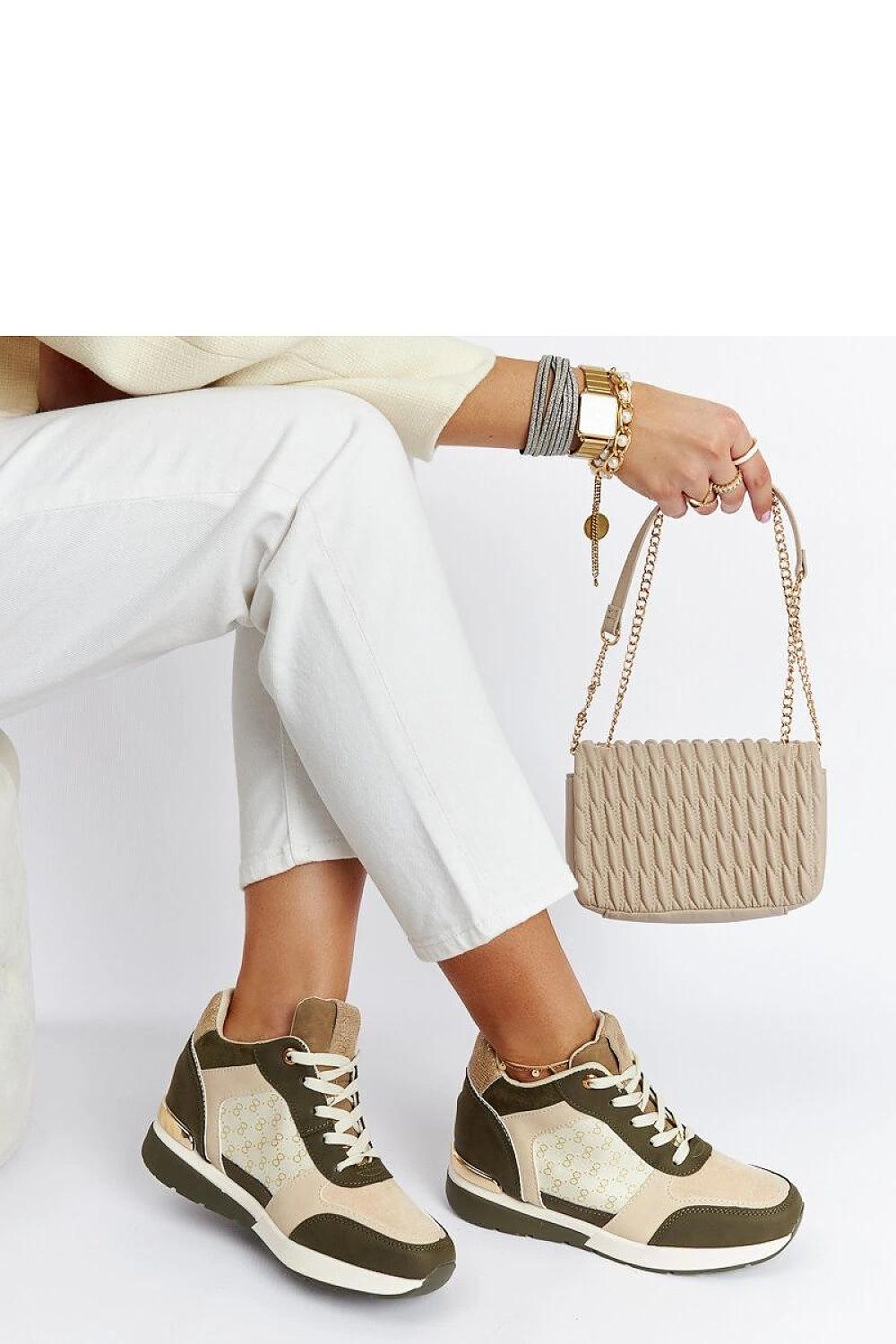 Solea Black Eco-Leather Wedge Sneakers displayed elegantly on a surface, emphasizing their fashionable and durable design.