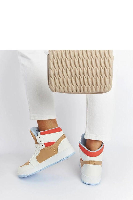 Close-up view of Solea Eagan Sneakers, highlighting the eco leather texture and blue rubber sole.