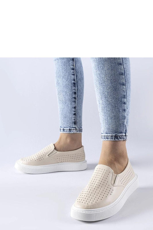 Luxury beige perforated sneakers by Solea, showcasing a sleek design with high-quality synthetic leather for summer elegance.