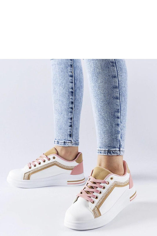 Sophisticated Solea platform sneakers in white and pink, designed for women, showcasing lightweight faux leather construction and a chic lace closure.