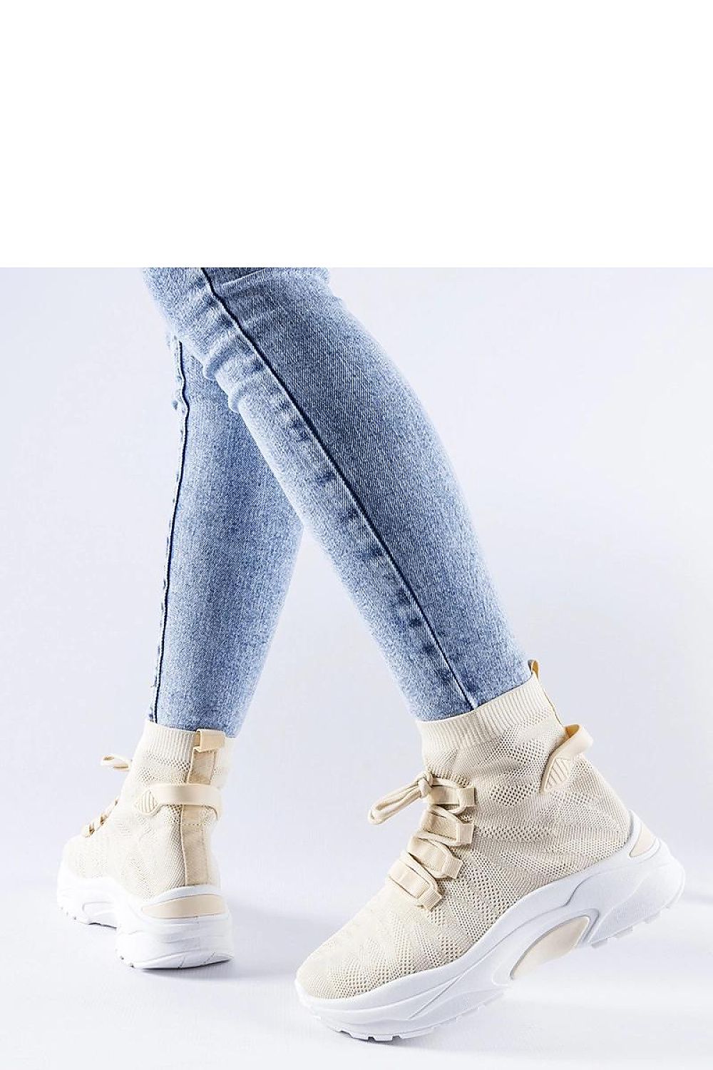 Elegant beige high top sneakers by Solea, featuring a stylish design and durable rubber sole, perfect for casual spring and summer outings.