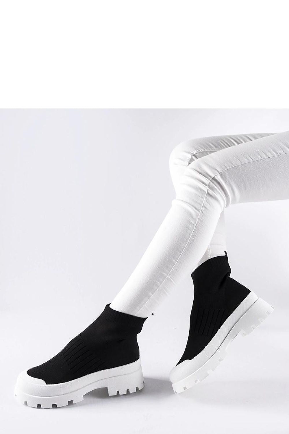 Elegantly designed white Varden slip-on sneakers for women from Solea, showcasing a lightweight white rubber sole and perfect fit for all-day wear.