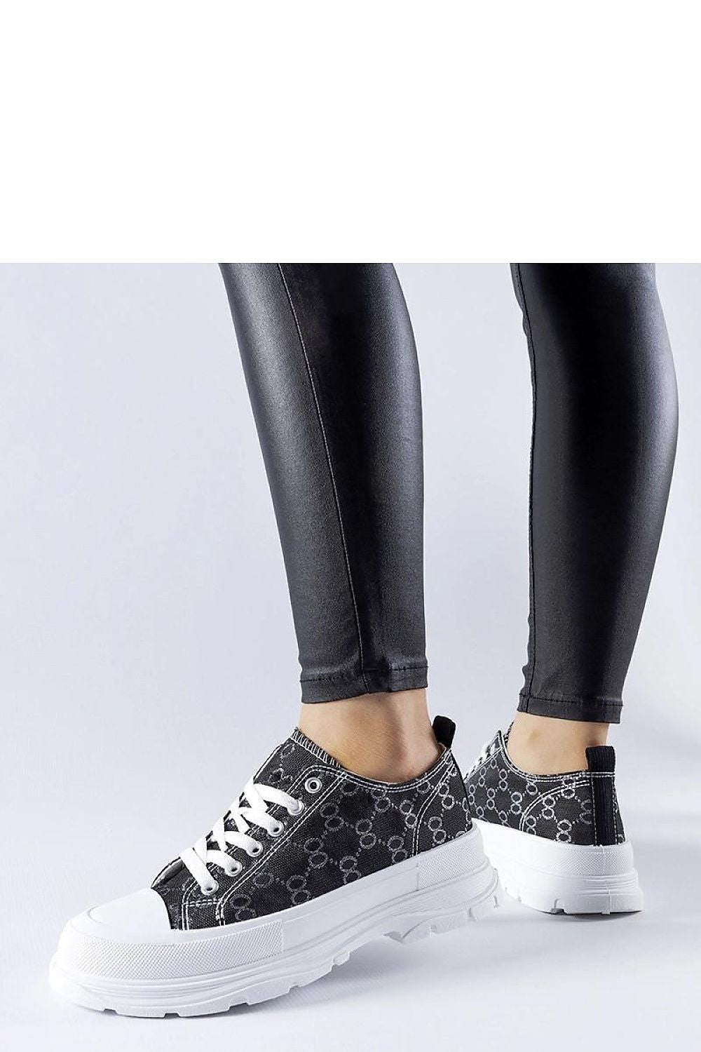 Elegant black sneakers with Antonella monogram by Solea, featuring a medium heel and designed for women in sizes EU 36-41 (US 5.5-10.5). Ideal for summer with round toe and elastic rubber sole for comfort and style.