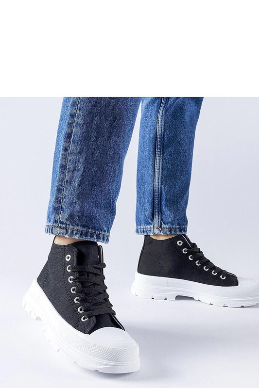 Luxury black high-top sneakers Herndon by Solea showcased in a stylish summer setting, featuring a breathable fabric design and modern round toe.
