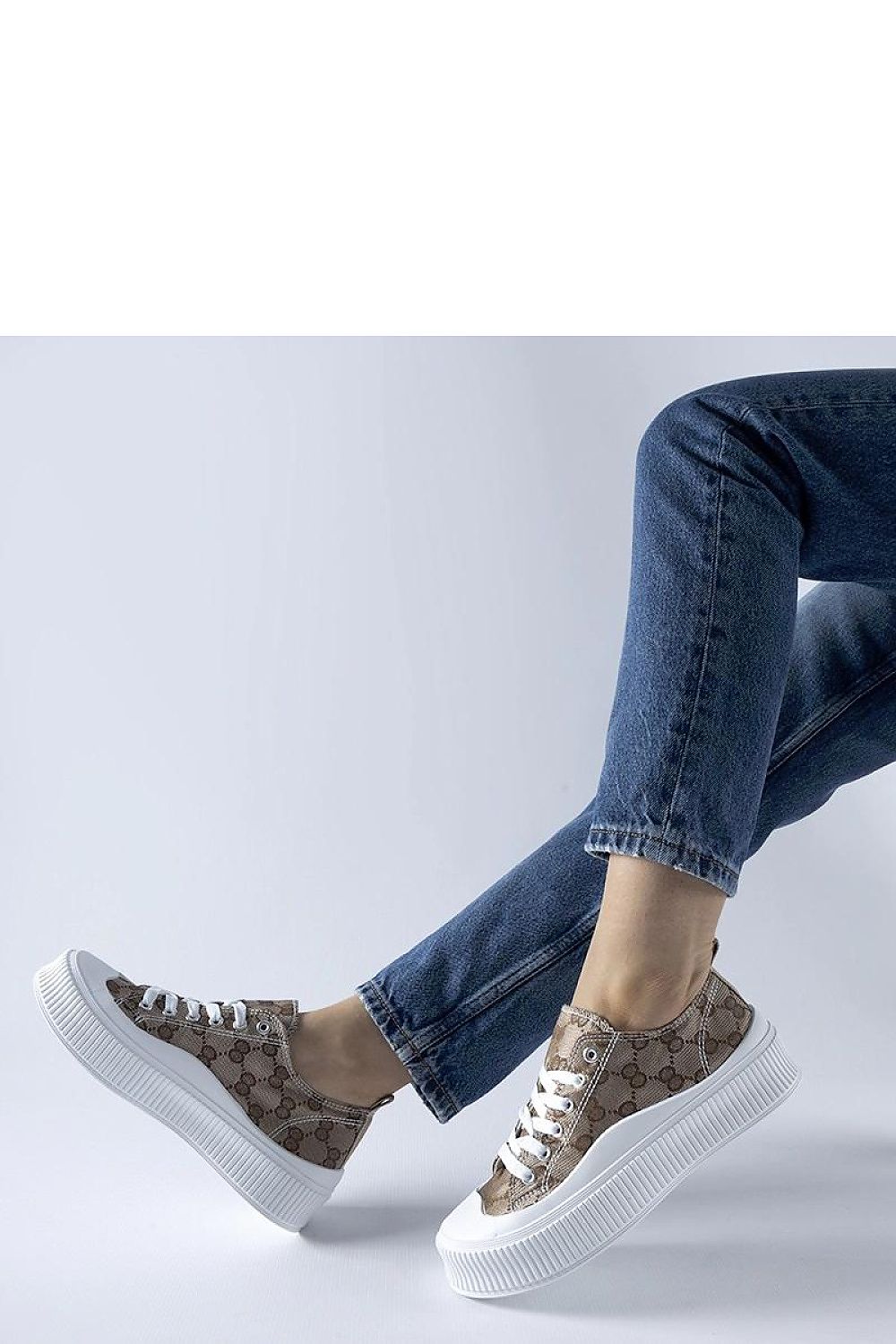 Solea Brown Sneakers displayed in an outdoor summer setting, emphasizing their stylish appearance and comfortable fit.