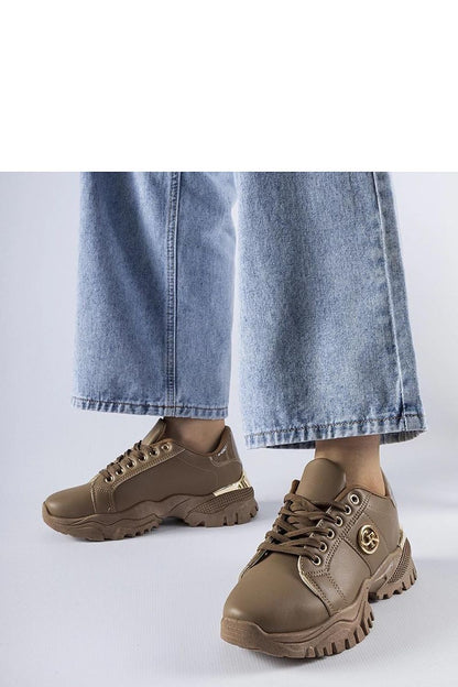 Luxury brown sneakers by Solea featuring a chunky Arpaia sole, designed for ultimate comfort and style.